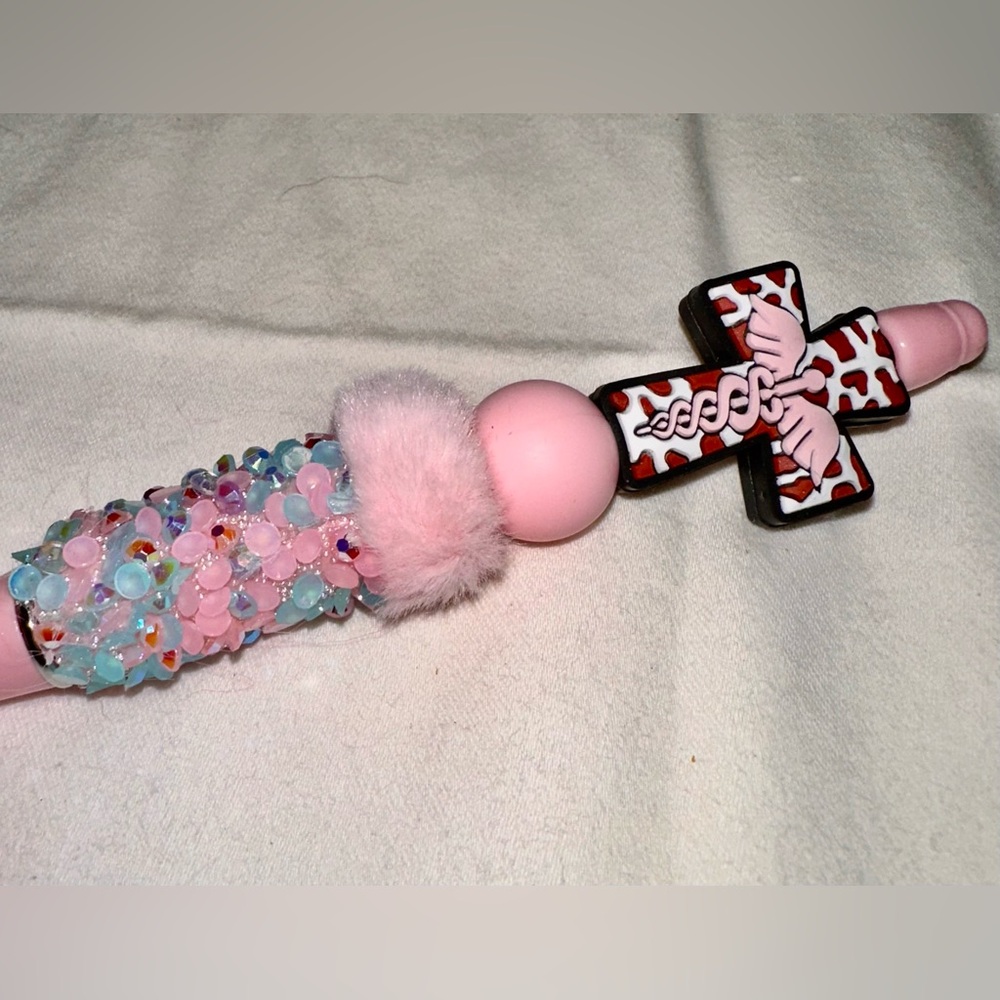 Healthcare Cross Handmade pen with pink accents and animal print.